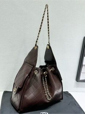 Chanel beauty brown makeup bag cosmetic chain quilted leather